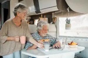 What to ask when shopping for an RV(https://www.timminsrv.com/what-to-ask-when-shopping-for-an-rv/) – Elderly couple in travel vacation inside a camper 2023 11 27 05 00 04 utc 300x196 jpg